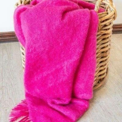 Cerise pink handwoven Mohair blanket Introducing our exquisite Mohair Cerise Pink Hand-Woven Blanket, a true epitome of elegance and comfort. Crafted with utmost care and skill, this luxurious blanket is designed to add a touch of sophistication and warmth to any space. Surprise a loved one with the gift of ultimate luxury.