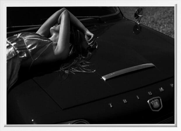 Woman Figure Laying on a Triumph Vintage Car Poster - Image 2